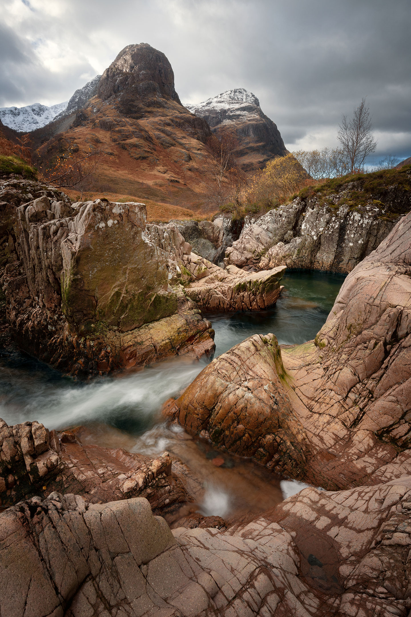 A pair of the Three Sisters looking down on the River Coe, Glencoe, Scotland